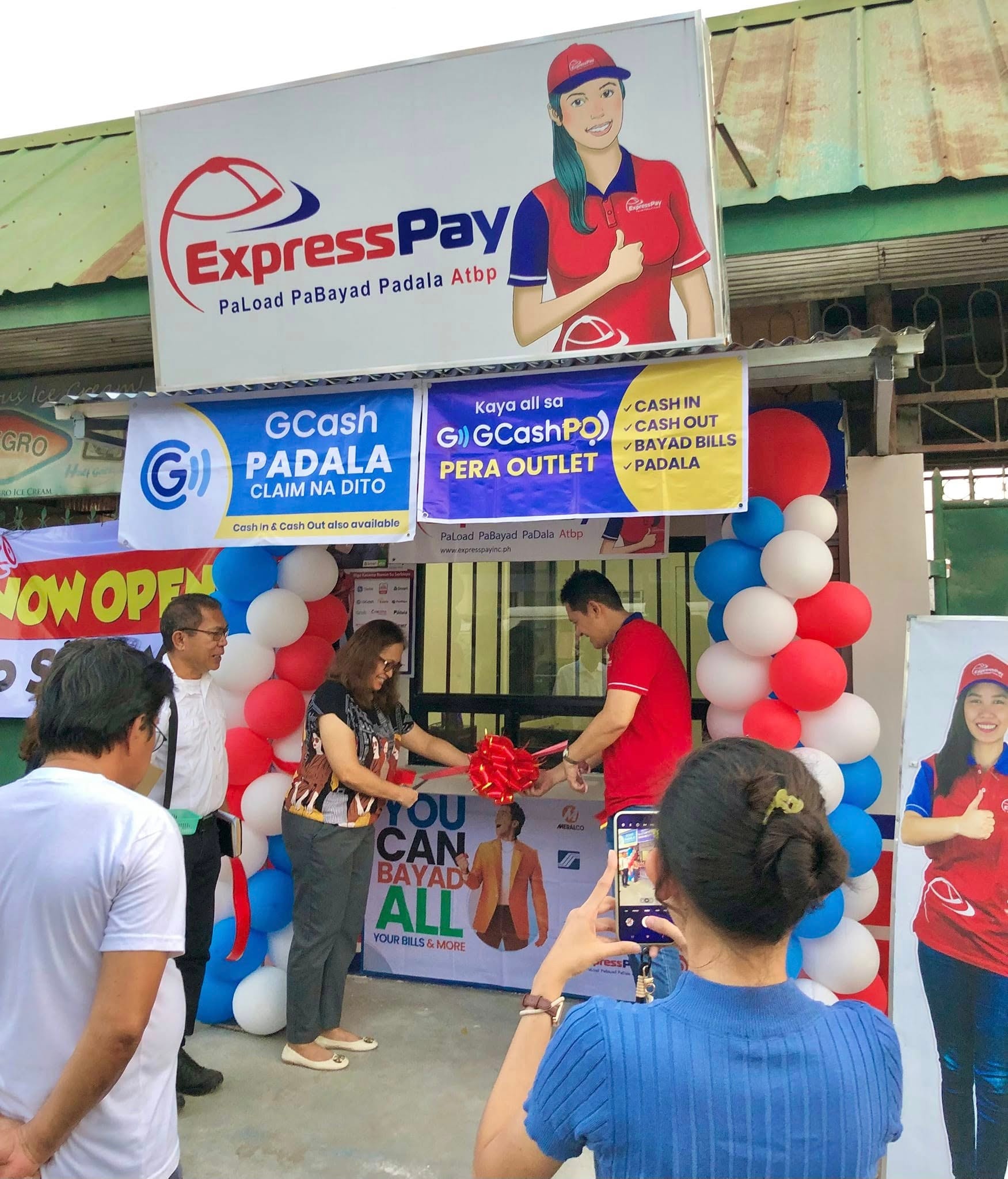 ExpressPay branch grand opening with ribbon cutting ceremony